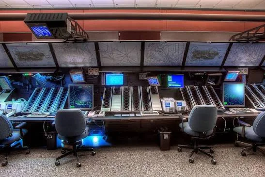 FAA air traffic control radar room — controllers monitoring radar scopes