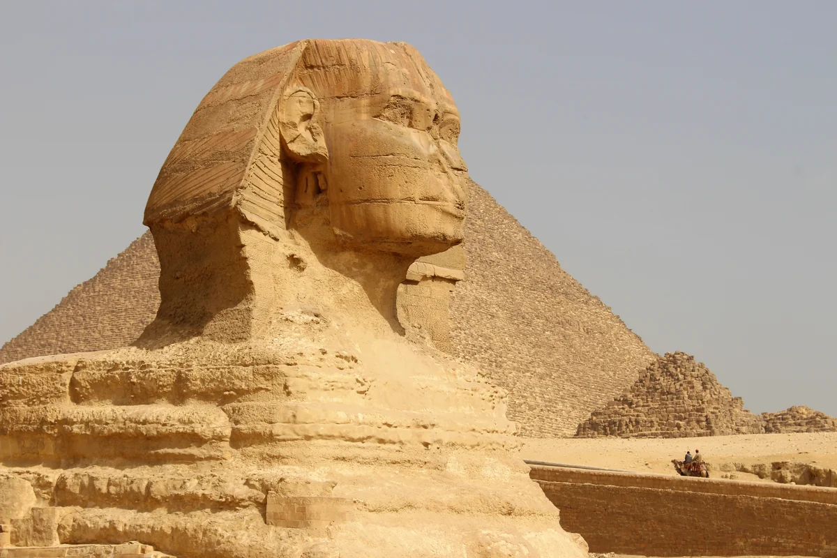 The Great Sphinx of Giza with the Pyramid of Khafre visible in the background; the northern cliff where NC2 is located lies beyond the principal monument zone