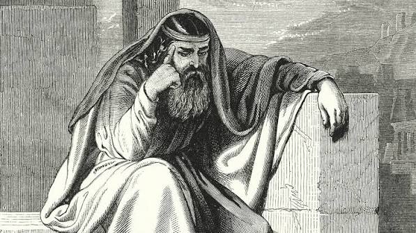 Historical engraving of the Prophet Ezekiel in contemplation among ruins